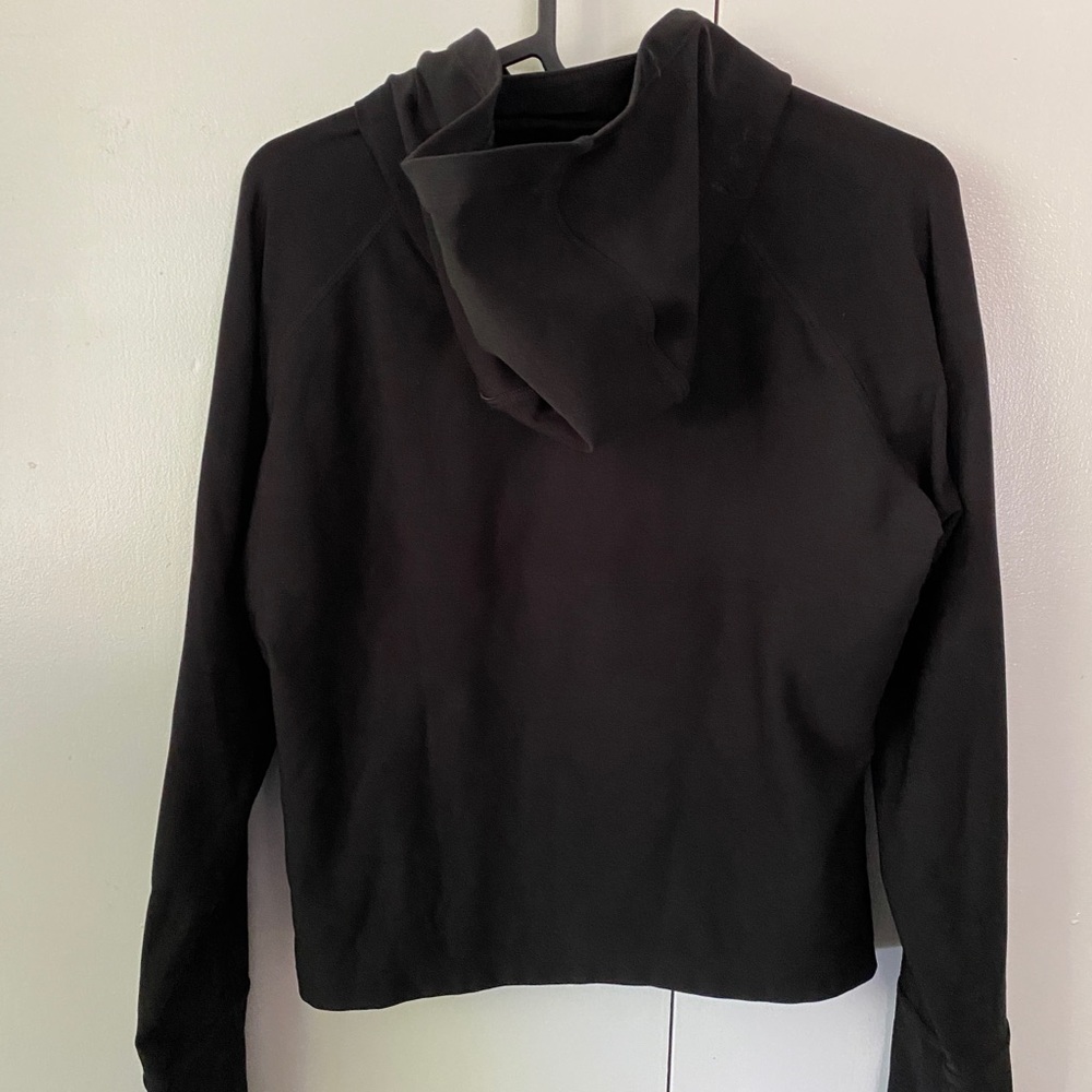 Black cropped  Nike women’s zip up. Size S (4-6)